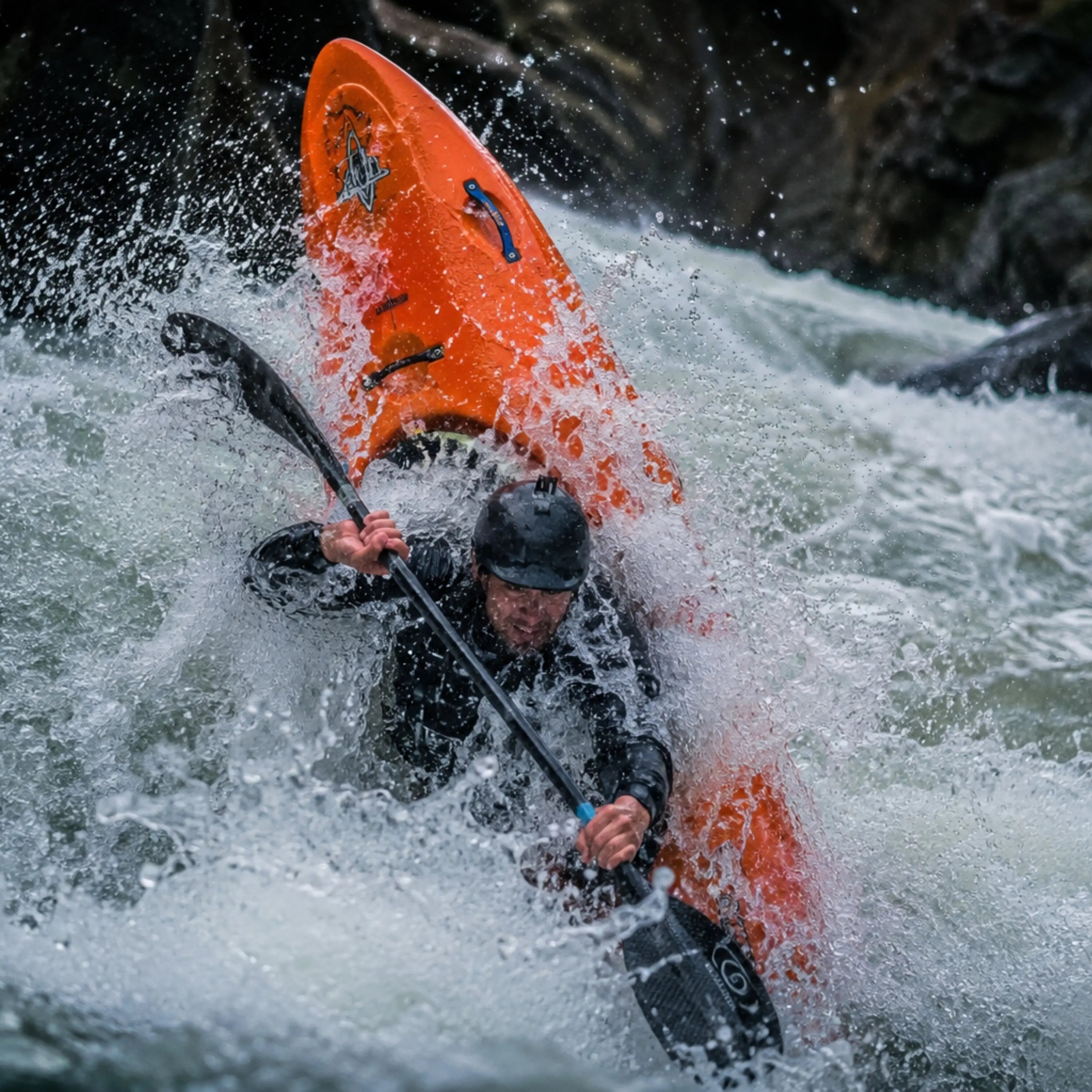 Whitewater paddling tees for kayakers who chase raw, intense rapids