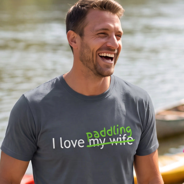Man laughing in the I Love Paddling tee in Dark Heather by the water — "I love my wife" crossed out for "paddling" — Vector Paddle