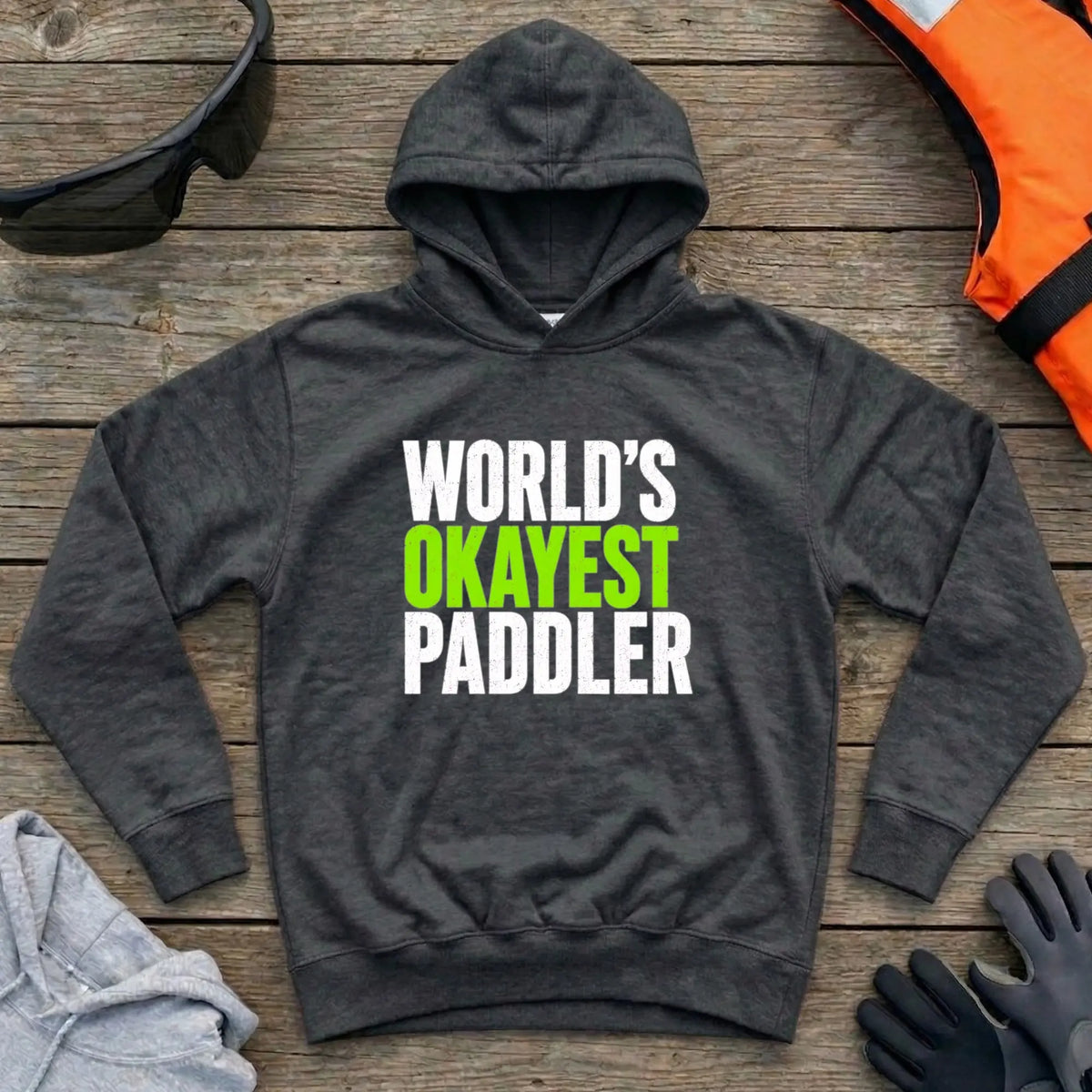 World's Okayest Paddler hoodie in Black — funny self-deprecating paddling slogan — Vector Paddle