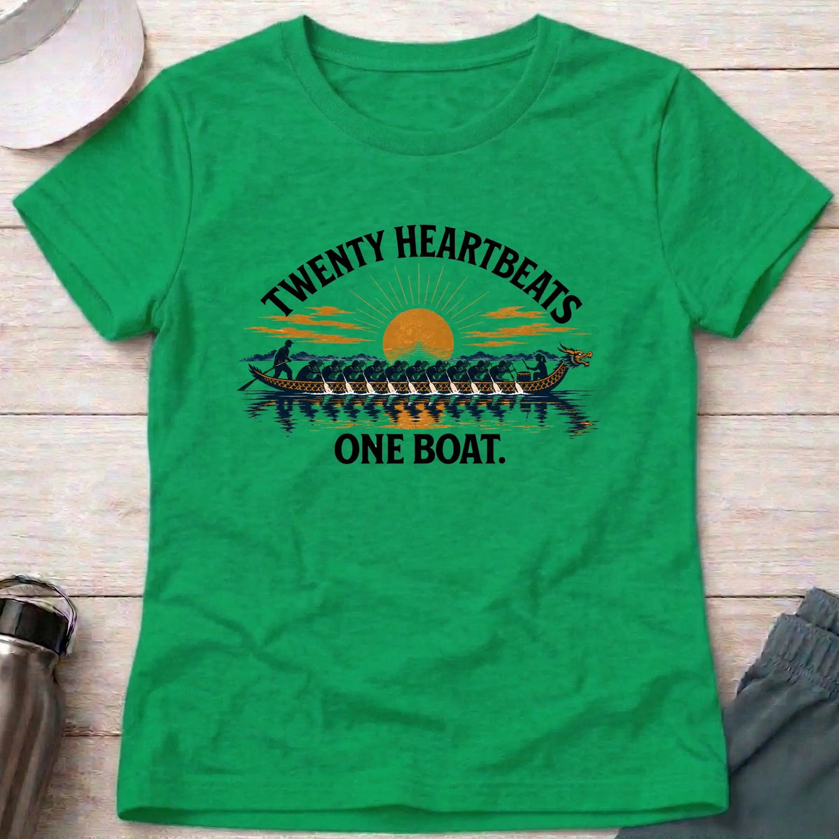 Twenty Heartbeats One Boat fitted tee in Irish Green — full-crew dragon boat at sunset — Vector Paddle