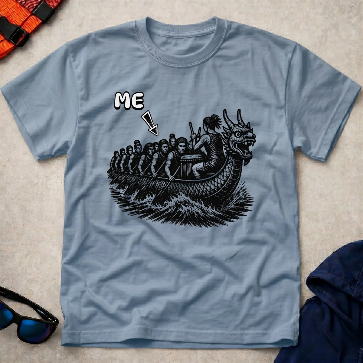 That's Me Engine Room tee in Light Blue — woodcut dragon boat with 'ME' arrow on a mid-boat paddler — Vector Paddle