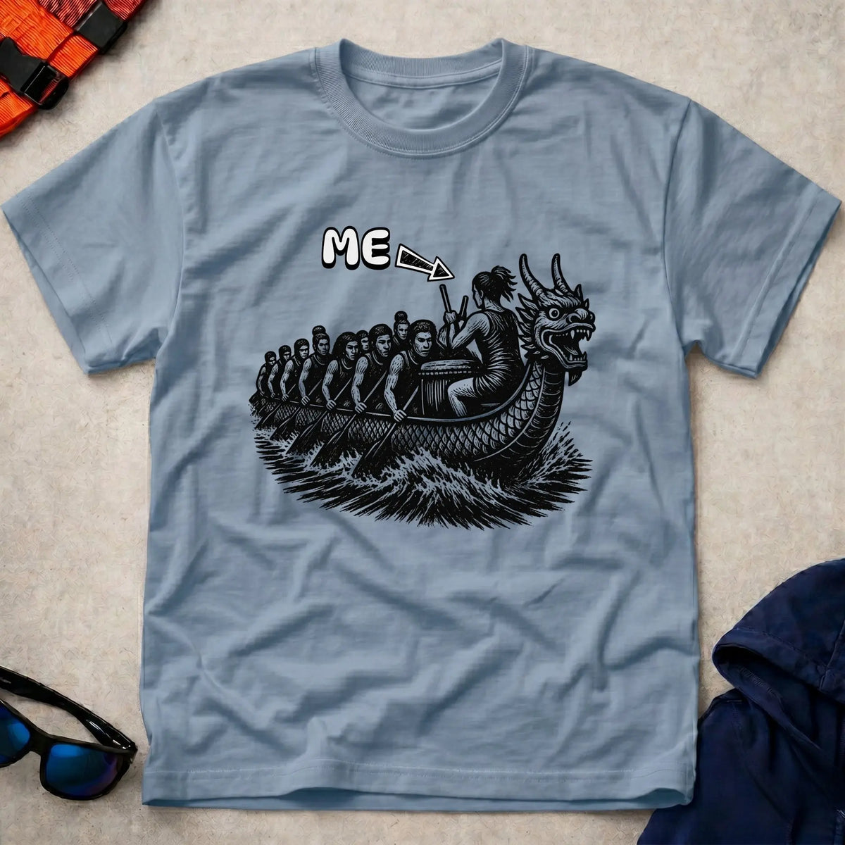 That's Me Drummer tee in Light Blue — woodcut dragon boat with 'ME' arrow on the drummer — Vector Paddle