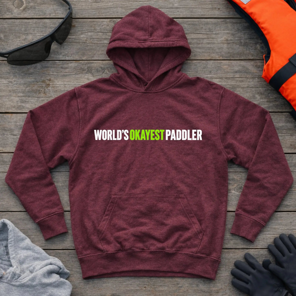 World's Okayest Paddler limited edition hoodie in Maroon — funny self-deprecating paddling slogan — Vector Paddle