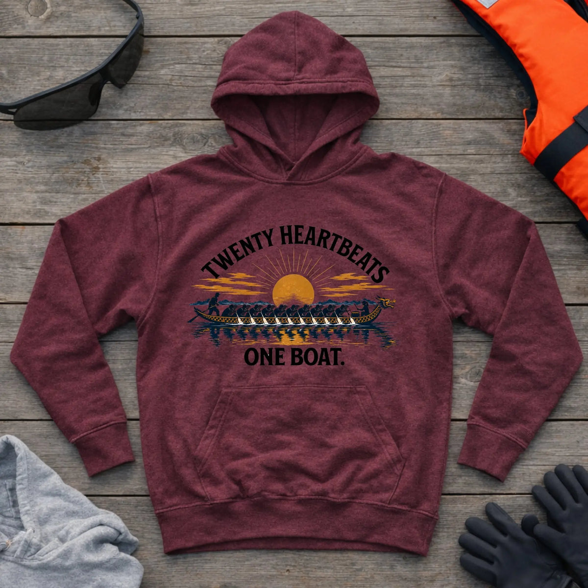 Twenty Heartbeats One Boat hoodie in Maroon — dragon boat crew paddling in unison — Vector Paddle