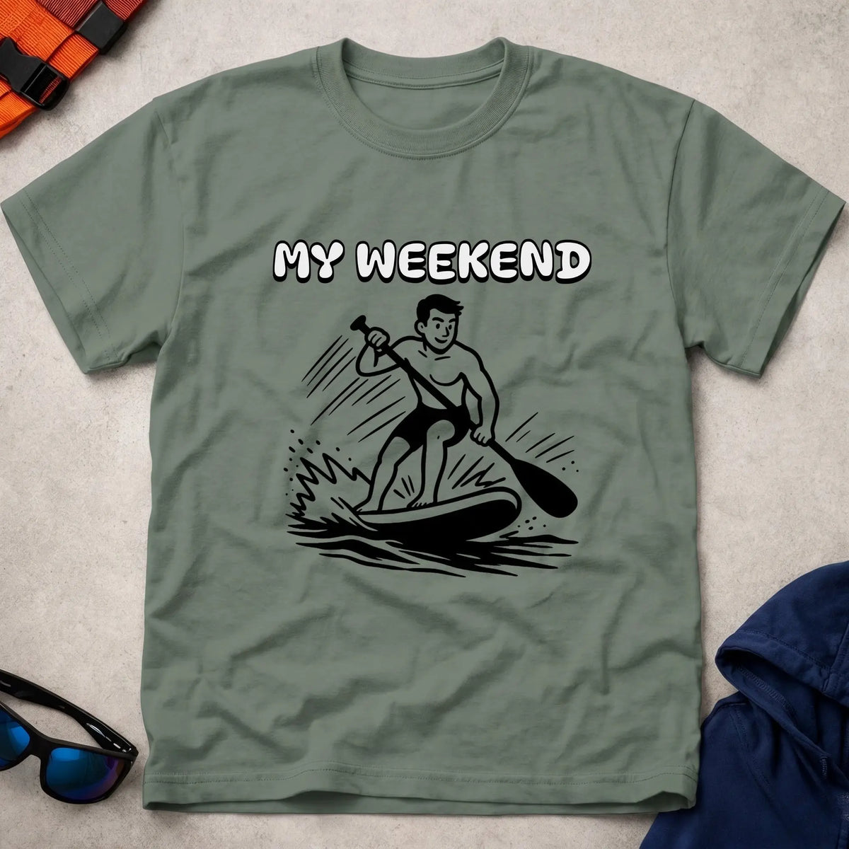 My Weekend SUP tee in Military Green — cartoon stand-up paddleboarder with 'My Weekend' lettering — Vector Paddle