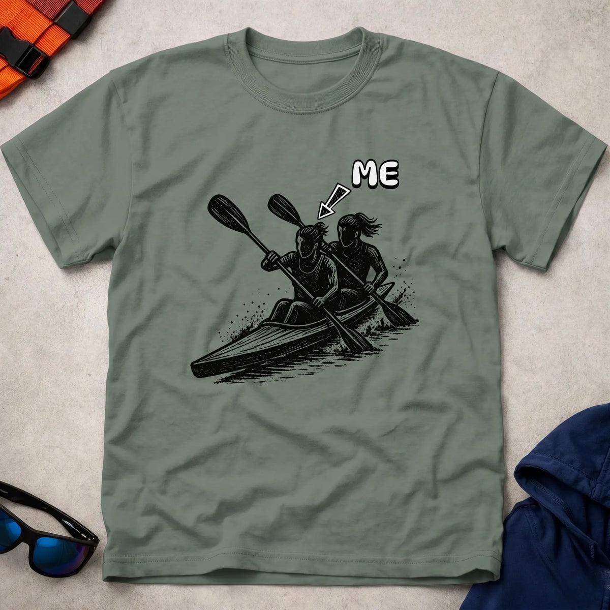 That's Me K2 Bow tee in Military Green — woodcut K2 kayak with 'ME' arrow on the bow paddler — Vector Paddle