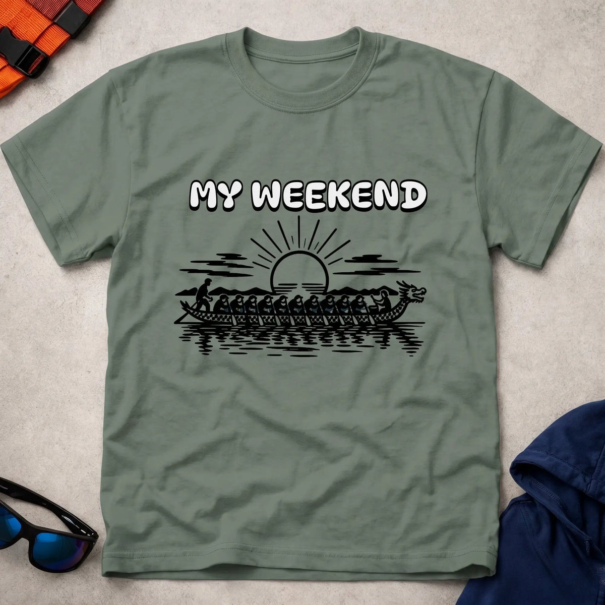 My Weekend Dragon Boat tee in Military Green — dragon boat crew at sunrise with 'My Weekend' lettering — Vector Paddle