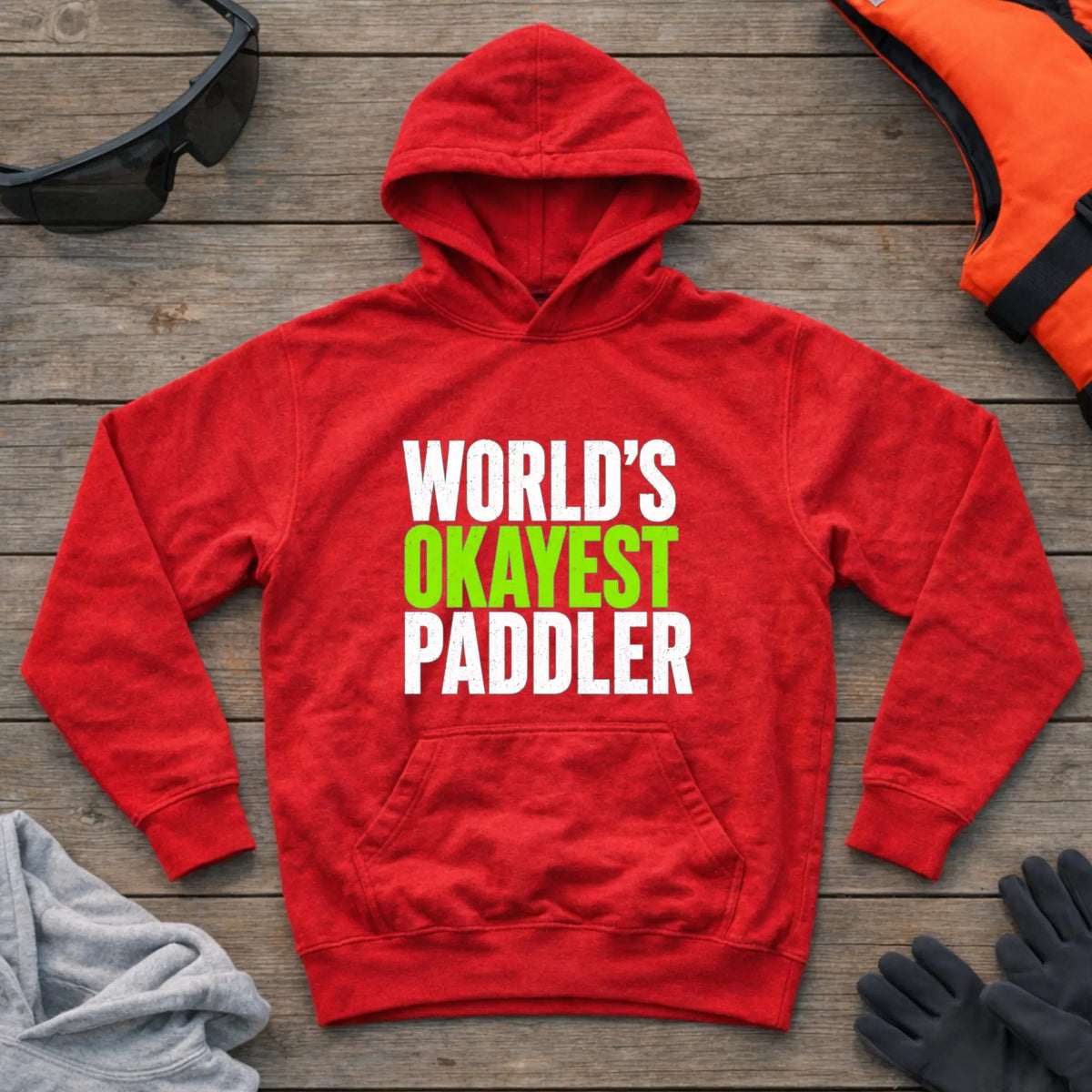 World's Okayest Paddler hoodie in Red — funny self-deprecating paddling slogan — Vector Paddle