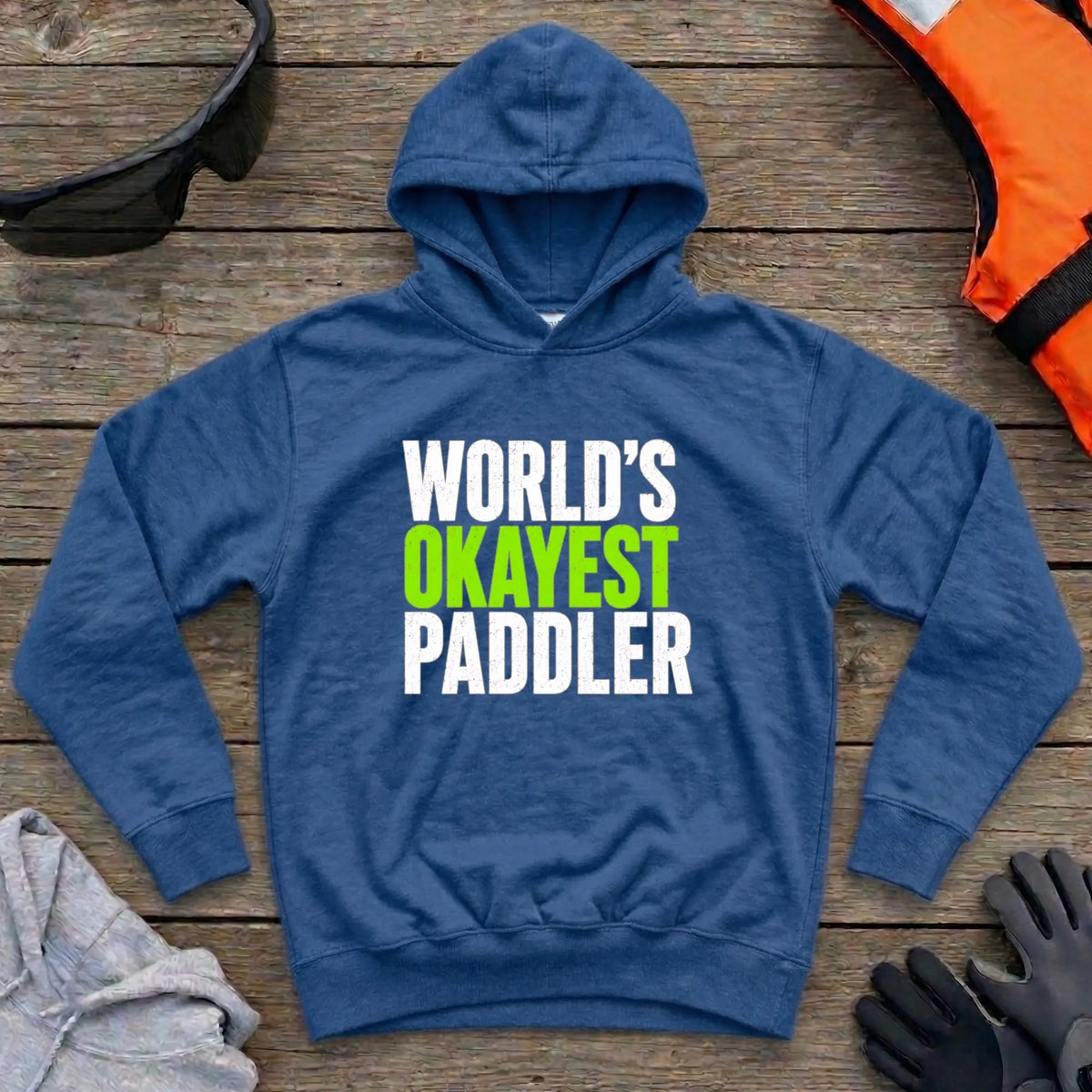 World's Okayest Paddler hoodie in Royal — funny self-deprecating paddling slogan — Vector Paddle